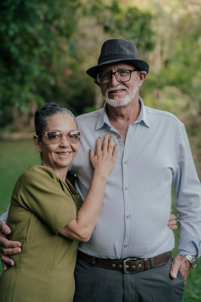 Elderly Man Embracing His Wife